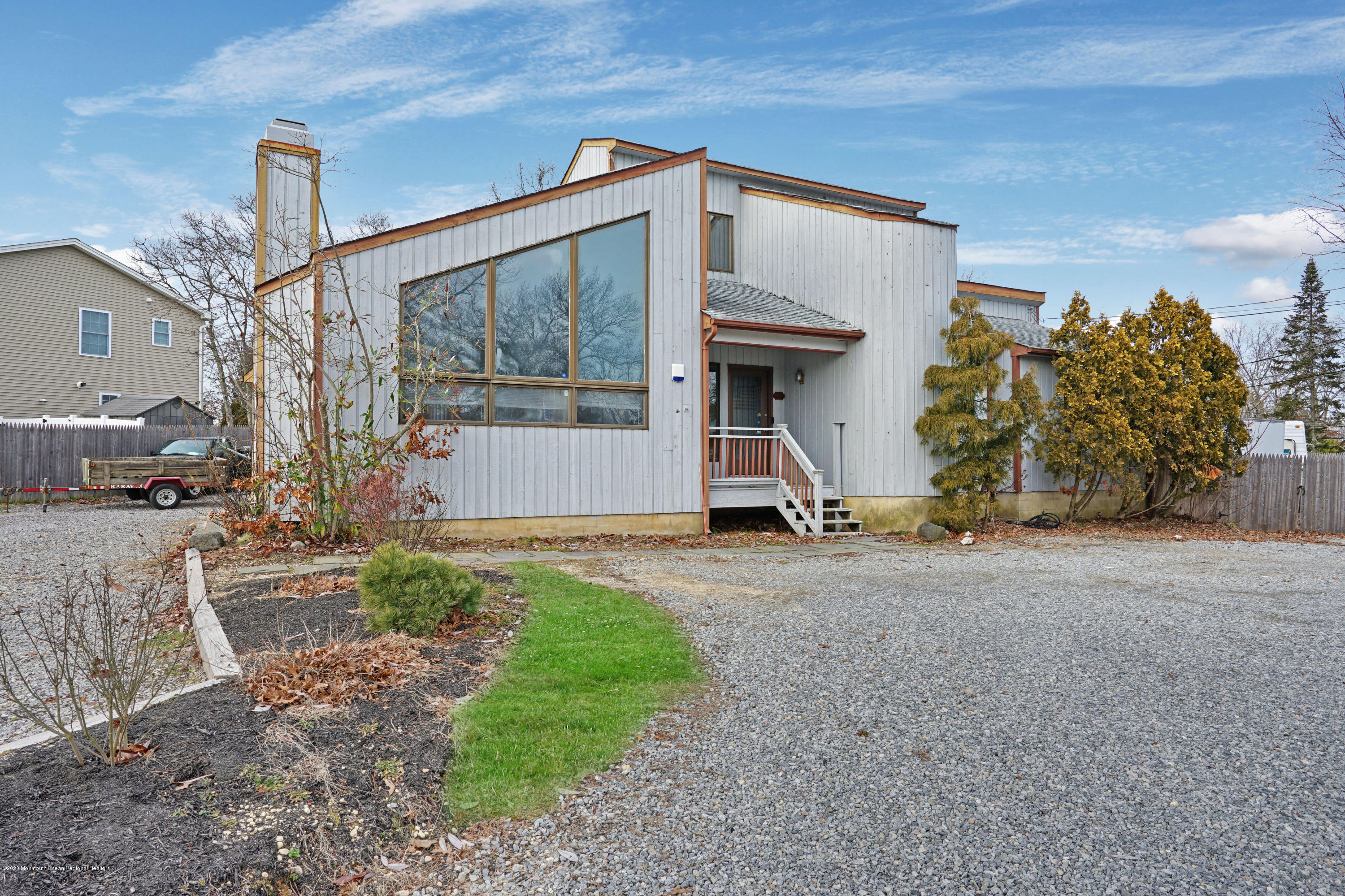 1761 Whitcomb Road Forked River, NJ 08731 - Photo 4 of 41 a view of a house with a yard and garage