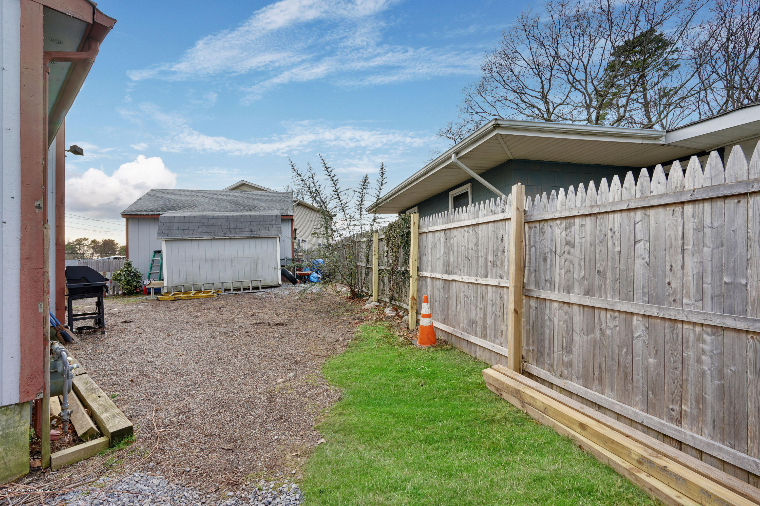1761 Whitcomb Road Forked River, NJ 08731 - Photo 33 of 41 a view of a small yard and wooden fence