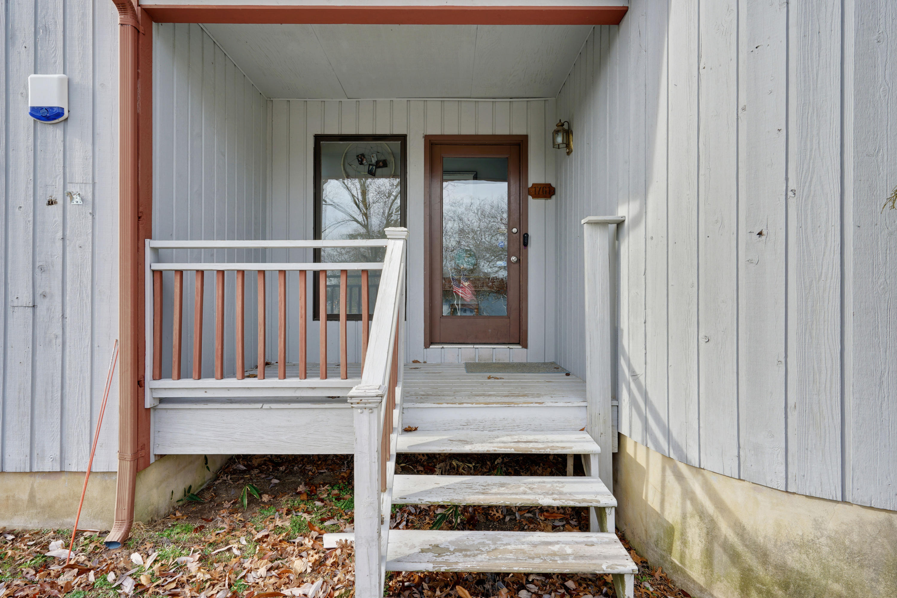 1761 Whitcomb Road Forked River, NJ 08731 - Photo 40 of 41 a view of entryway wooden floor and front door