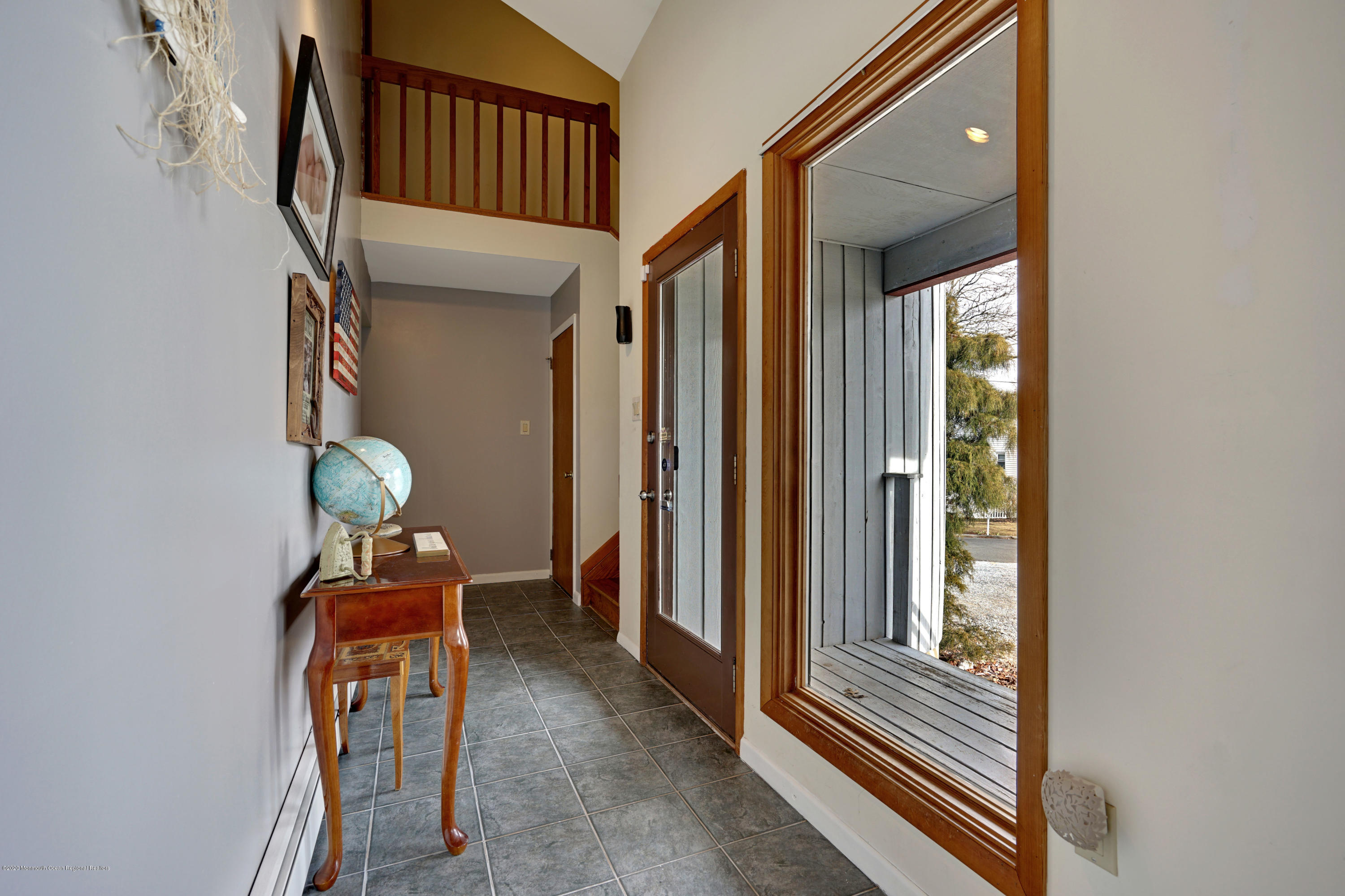1761 Whitcomb Road Forked River, NJ 08731 - Photo 7 of 41 a view of front door with chair