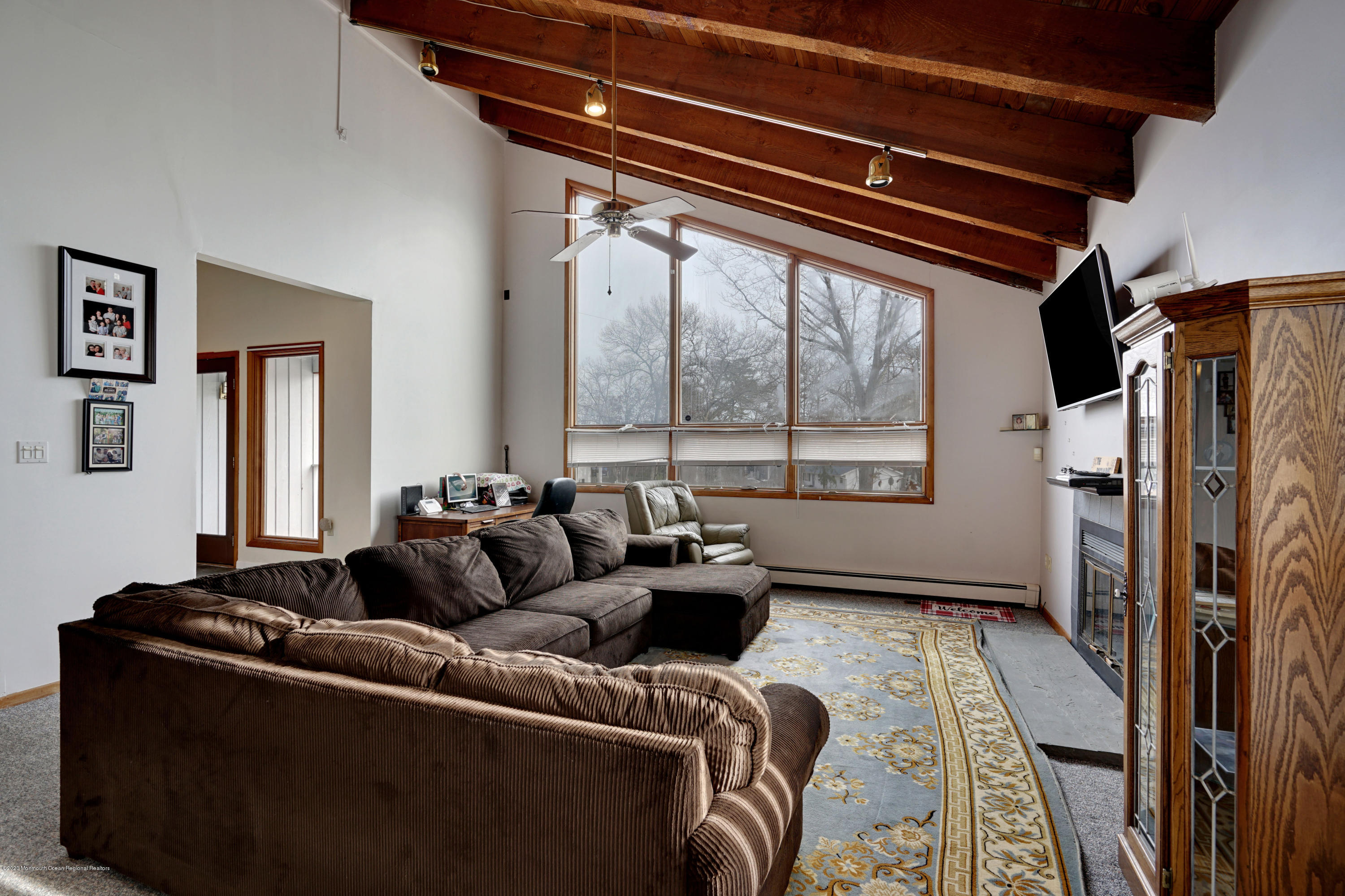 1761 Whitcomb Road Forked River, NJ 08731 - Photo 10 of 41 a living room with furniture and a large window
