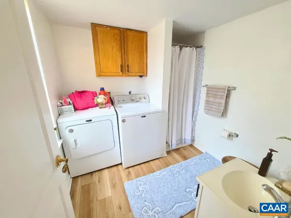 a utility room with a window dryer and washer