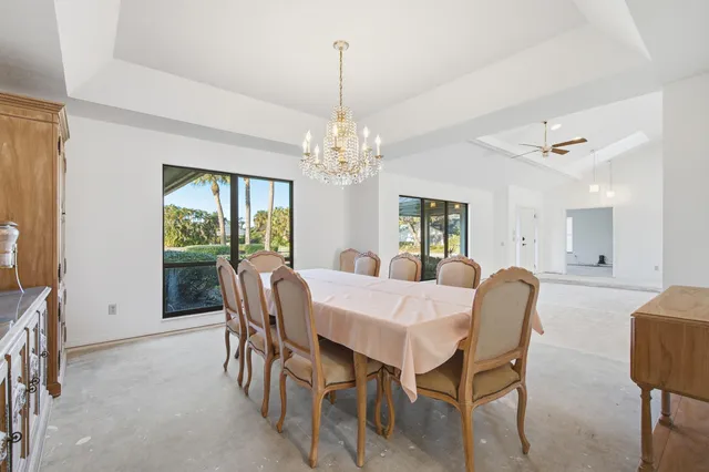 a bathroom with a double vanity sink mirror and shower