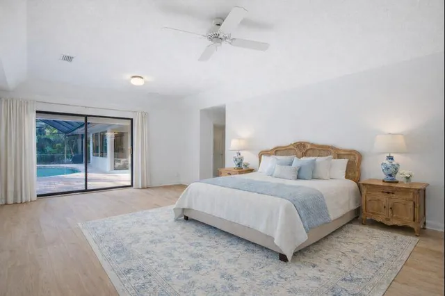 front view of a house with potted plants
