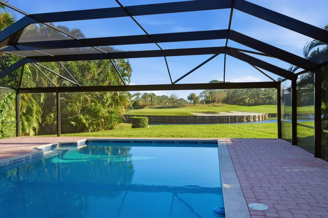 a view of indoor pool and sitting area