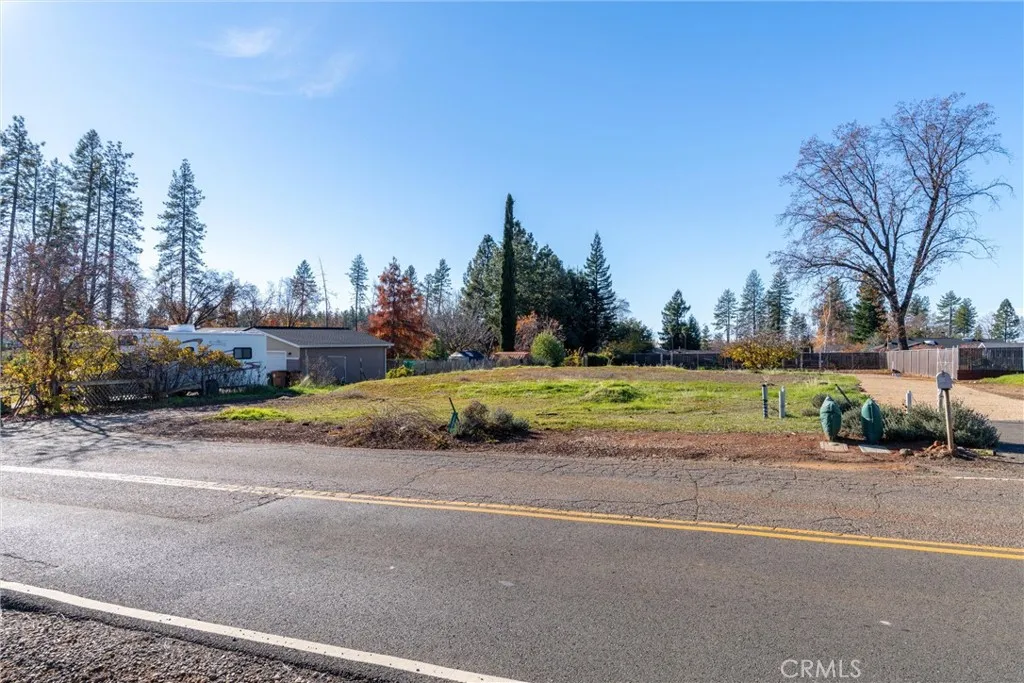 6337 Oliver Road Paradise, CA 95969 - Photo 15 of 21 a view of a house with a big yard and palm trees