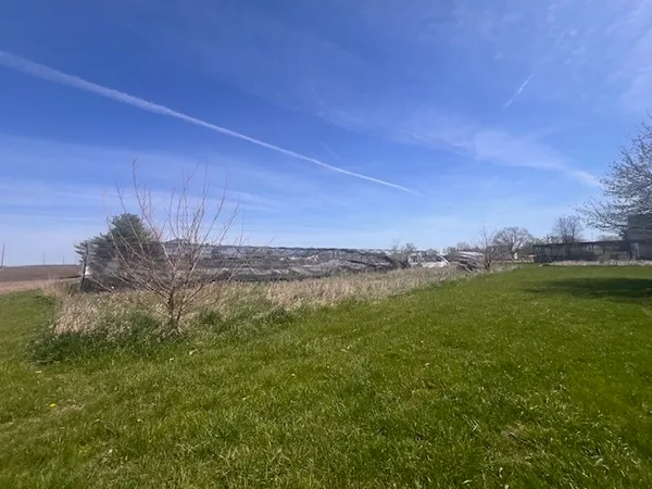 a view of a lush green field