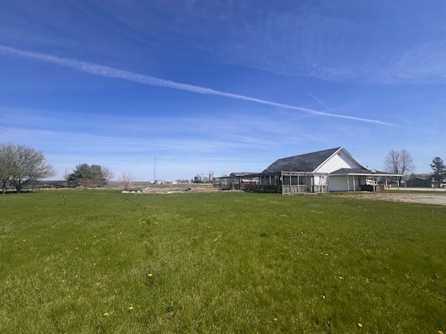 100 South 4th Street Wapella, IL 61777 - Photo 10 of 16 a view of a house with a big yard