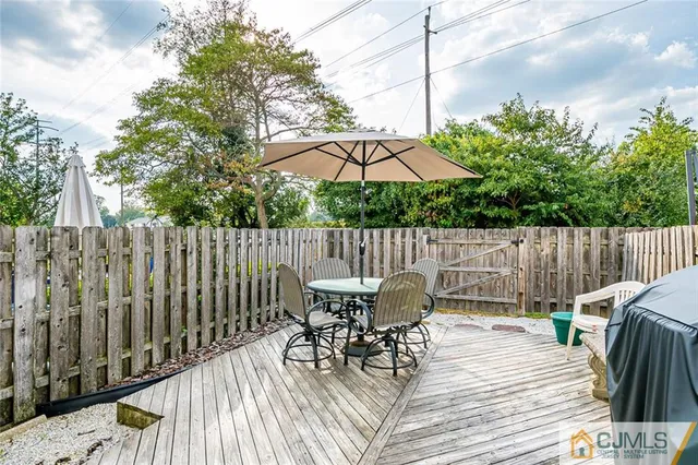 a view of a table and chairs in patio