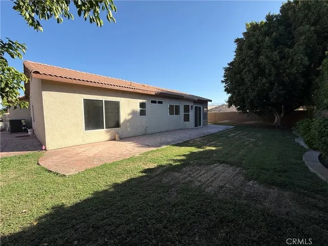 a house view with a garden space