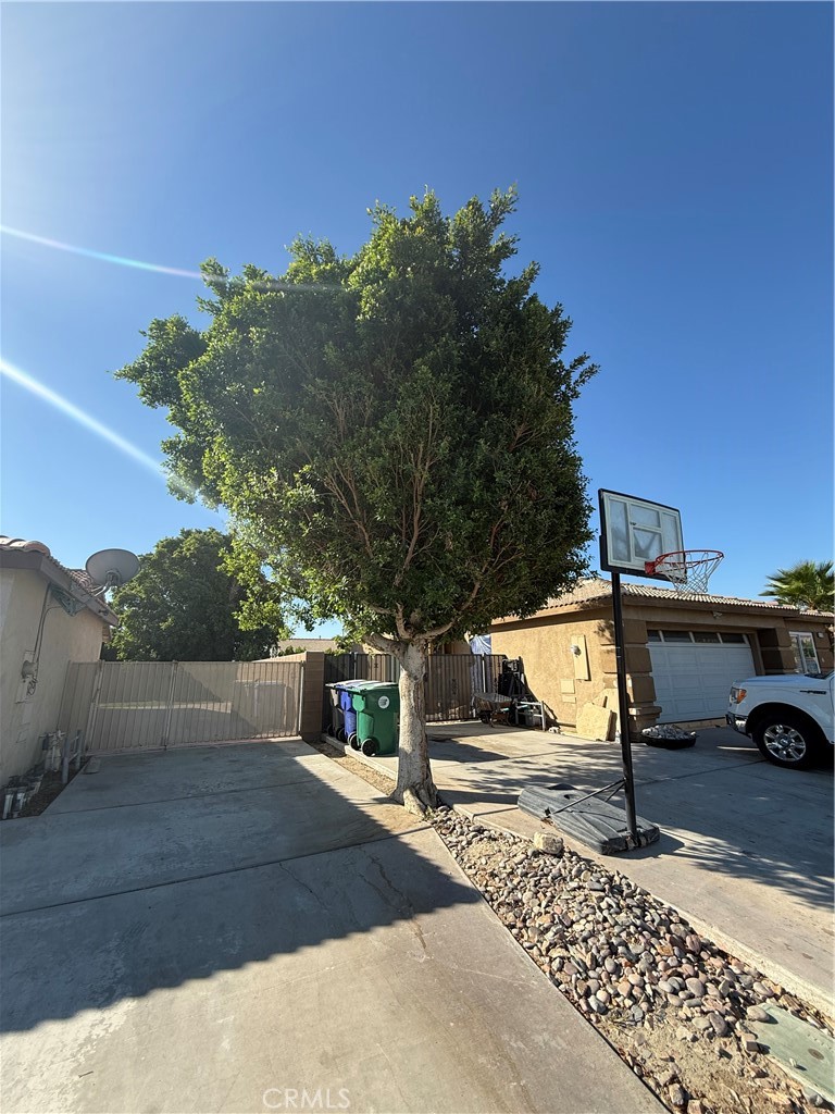 47686 Mirage Way Indio, CA 92201 - Photo 5 of 23 a view of street with tall buildings