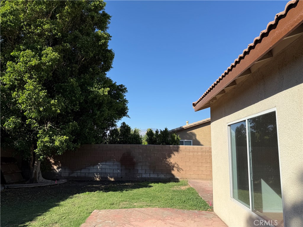 47686 Mirage Way Indio, CA 92201 - Photo 6 of 23 a view of backyard with green space
