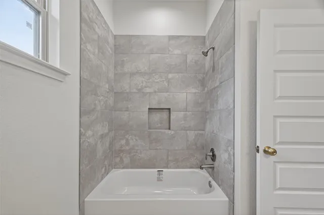 a bathroom with a bathtub