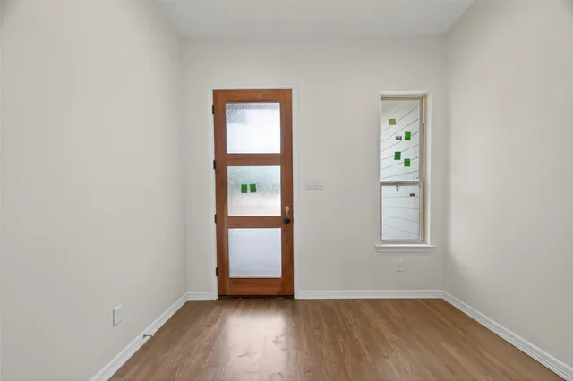 an empty room with window