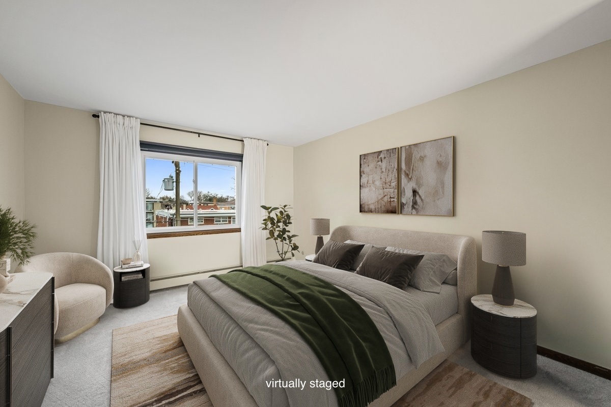 1279 Harding Avenue, Unit 3D Des Plaines, IL 60016 - Photo 14 of 23 a bedroom with a bed and a painting on the wall