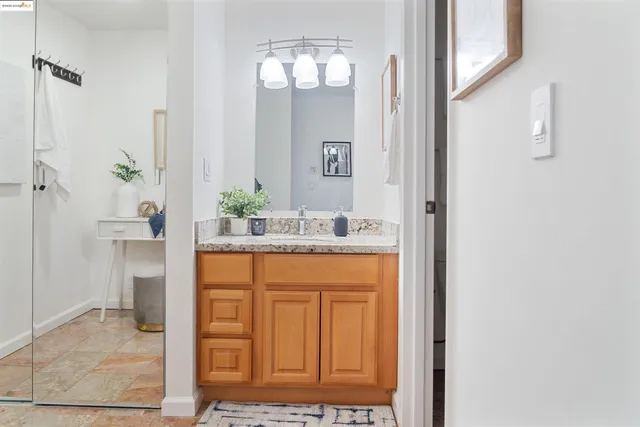 a bath room with a toilet and a bath tub