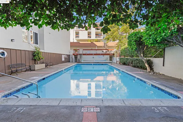 a view of a chairs on wooden deck