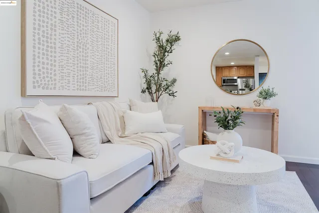 a bedroom with a bed and couch