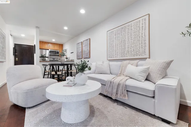 a bedroom with a bed and couch