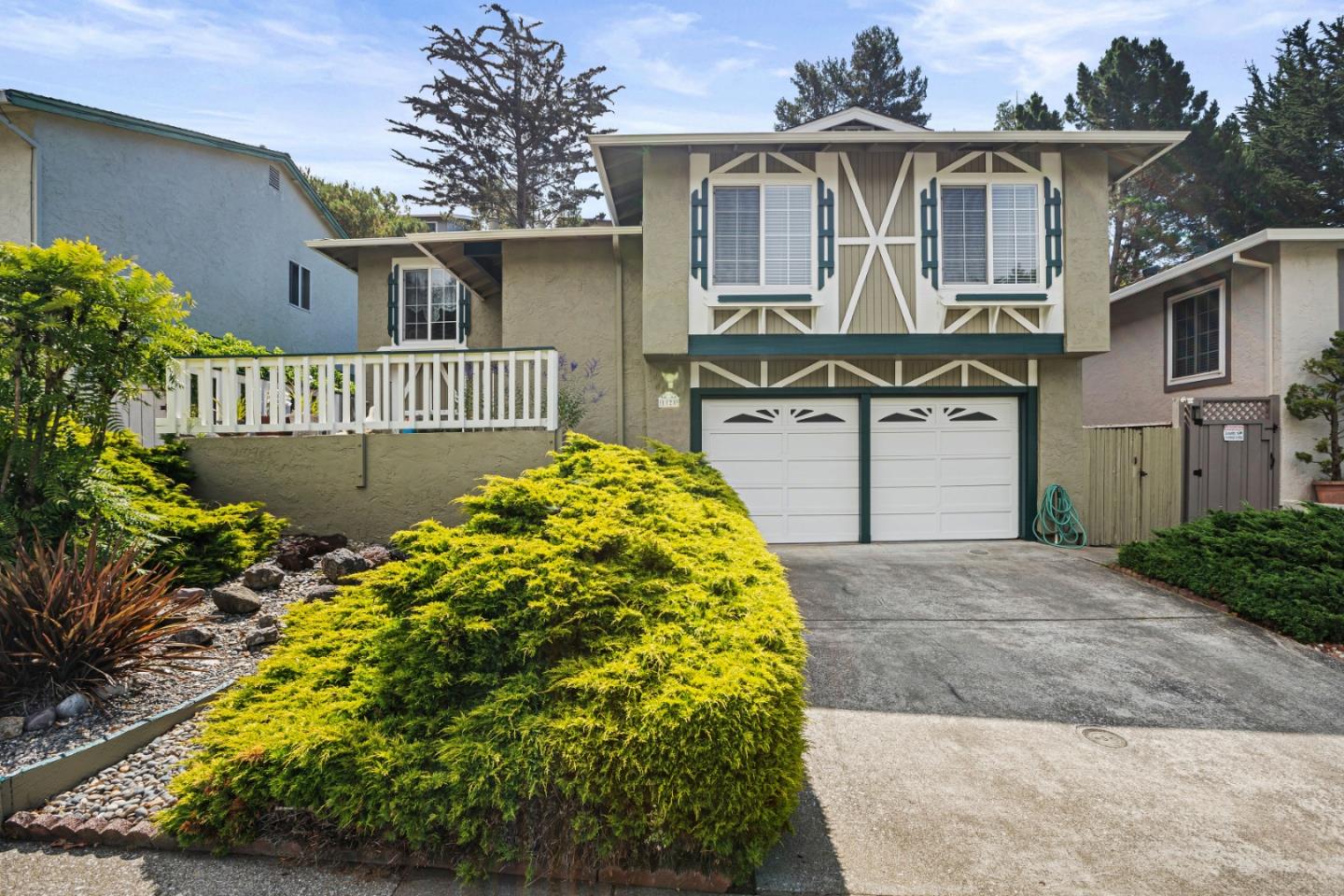1128 Oddstad Boulevard Pacifica, CA 94044 - Photo 1 of 35 front view of a house with a yard