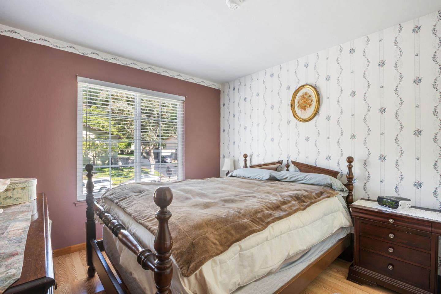 1128 Oddstad Boulevard Pacifica, CA 94044 - Photo 14 of 35 a bed room with a bed and a window