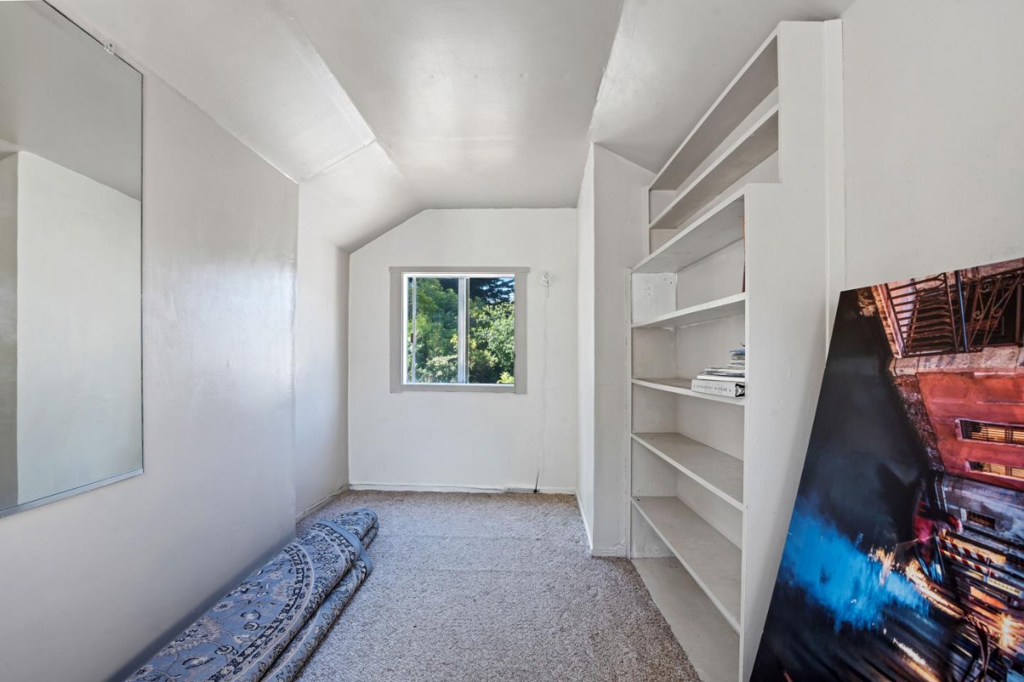 1128 Oddstad Boulevard Pacifica, CA 94044 - Photo 24 of 35 a view of walk in closet with empty racks