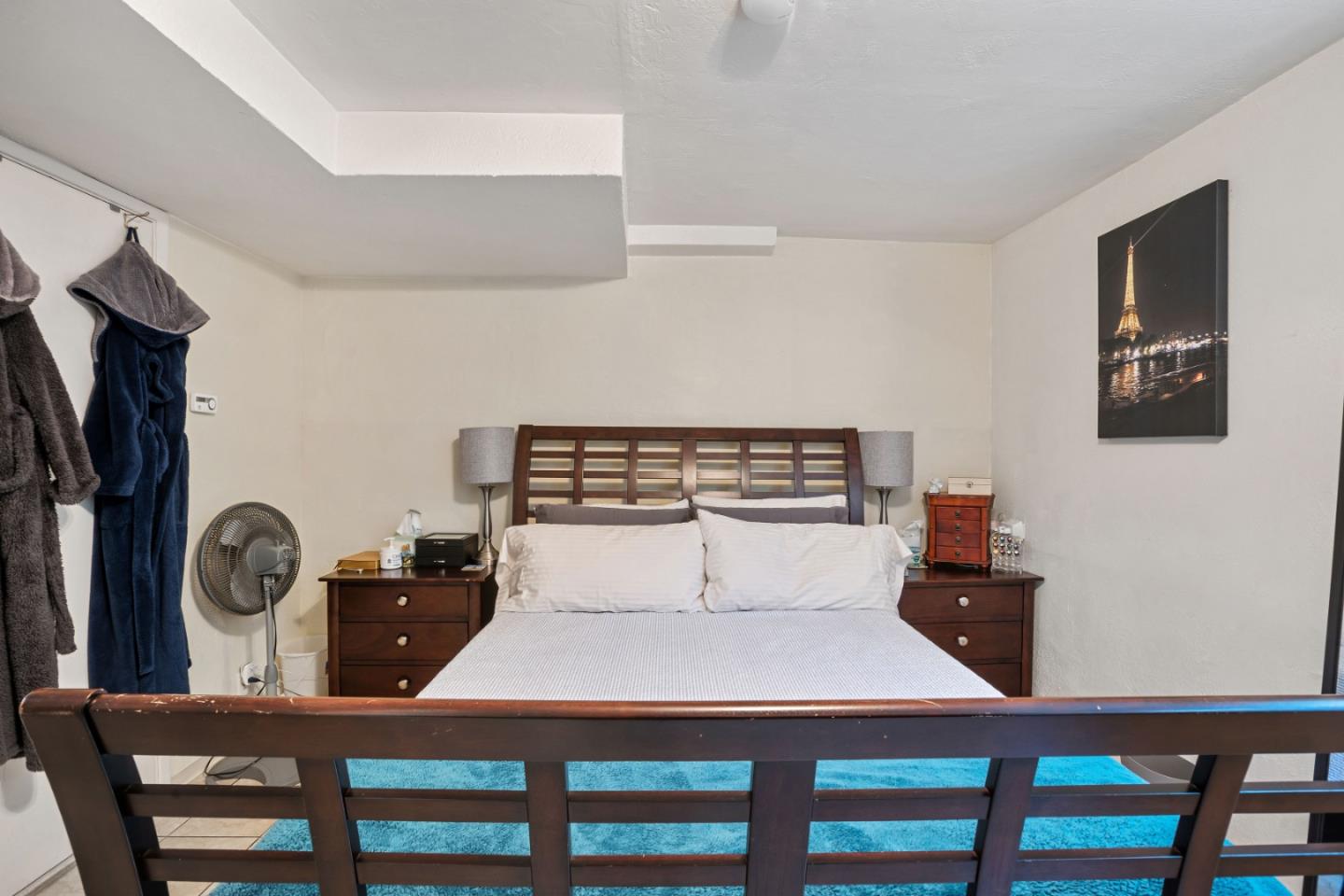 1128 Oddstad Boulevard Pacifica, CA 94044 - Photo 31 of 35 a dining room with a table chairs and a refrigerator
