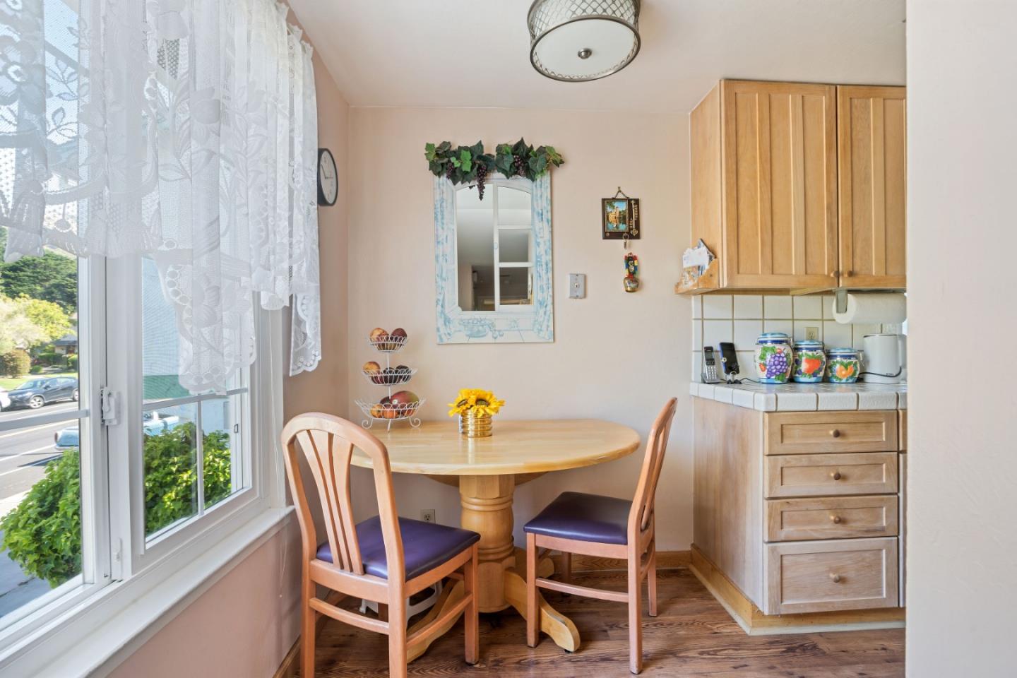 1128 Oddstad Boulevard Pacifica, CA 94044 - Photo 9 of 35 a dining room with furniture and window