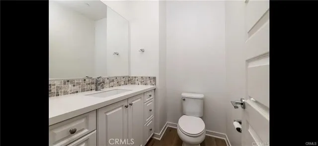 a bathroom with a sink and a toilet