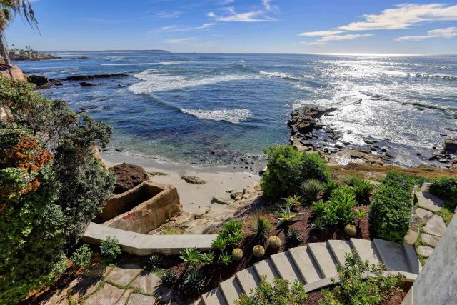 a view of a backyard of a house