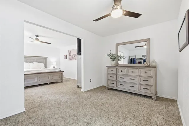 a room with a dresser and a dresser