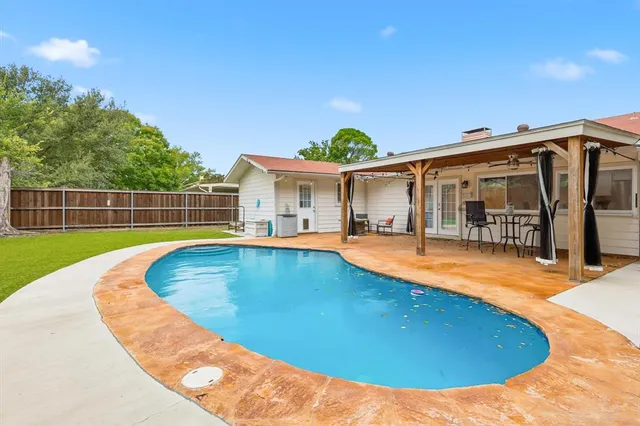 a view of a house with pool