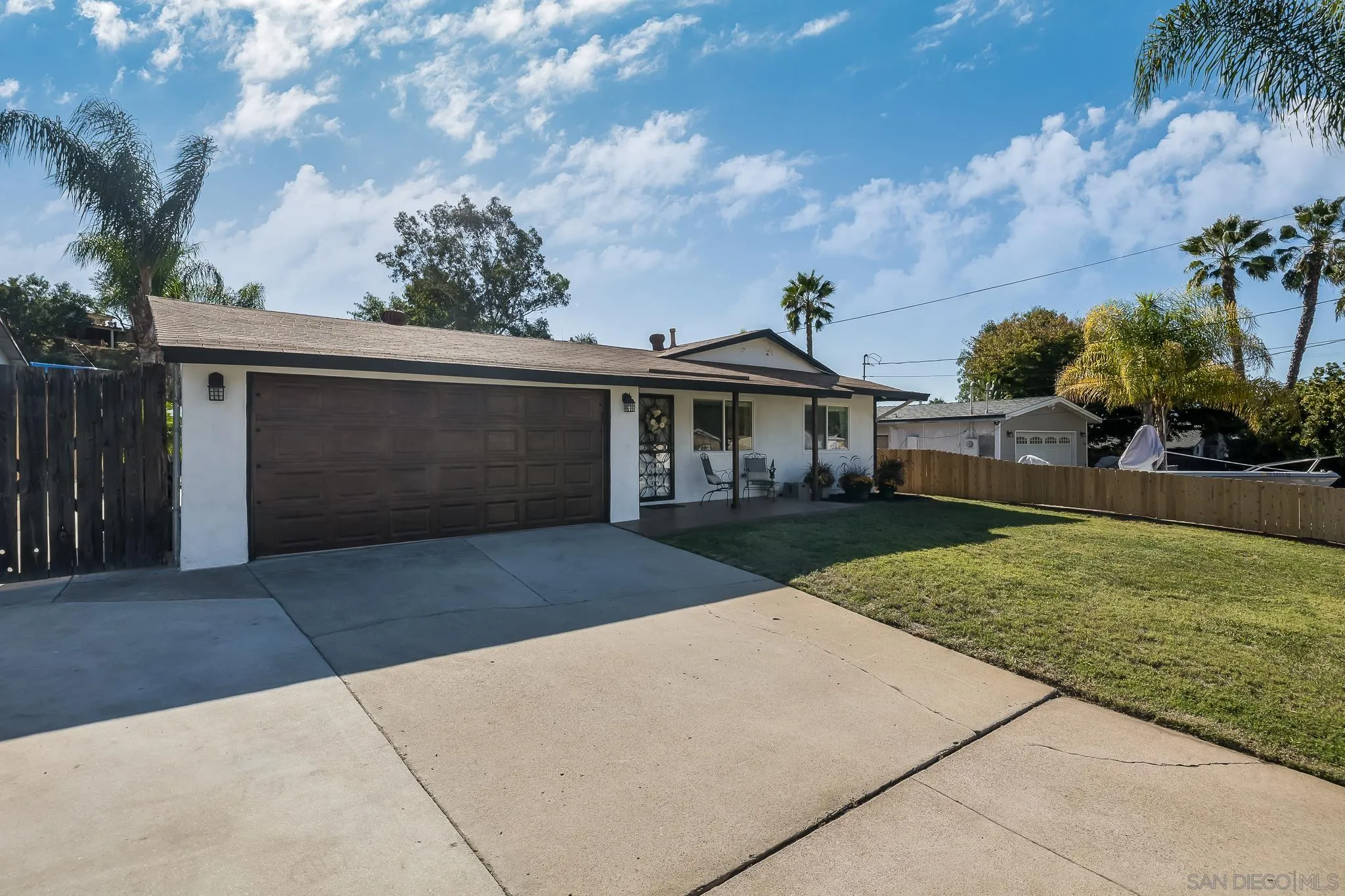 9126 Heatherdale Street Santee, CA 92071 - Photo 2 of 33 front view of house with a yard