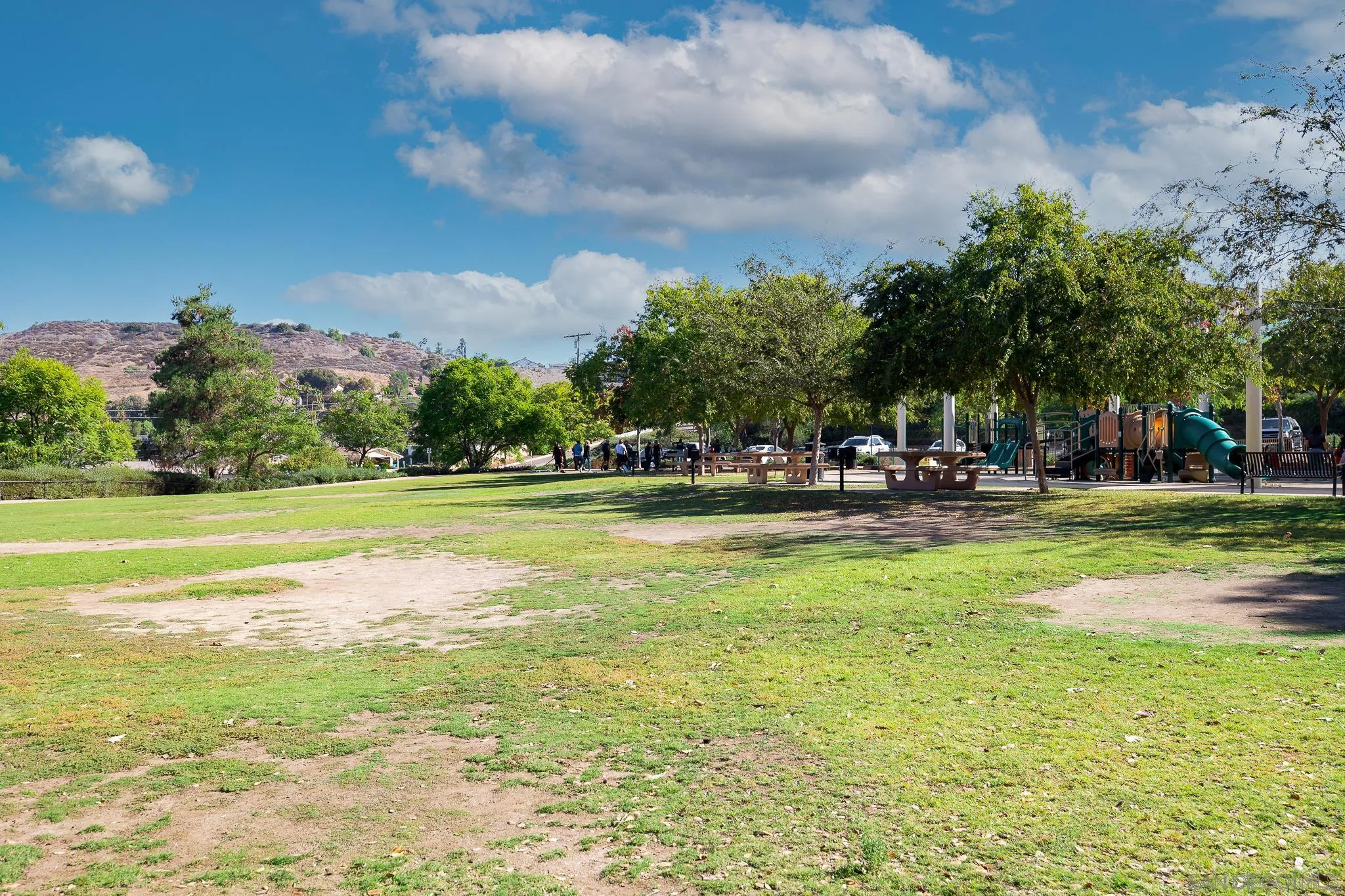 9126 Heatherdale Street Santee, CA 92071 - Photo 30 of 33 a view of swimming pool with lawn chairs and a big yard