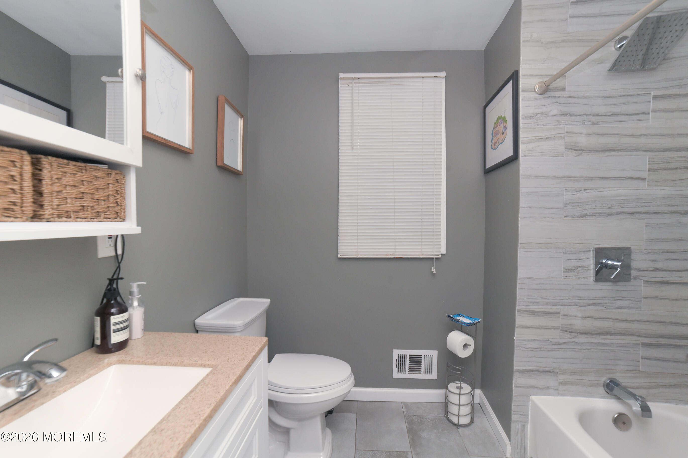 501 Gulden Street Keyport, NJ 07735 - Photo 11 of 14 a bathroom with a sink a toilet and shower