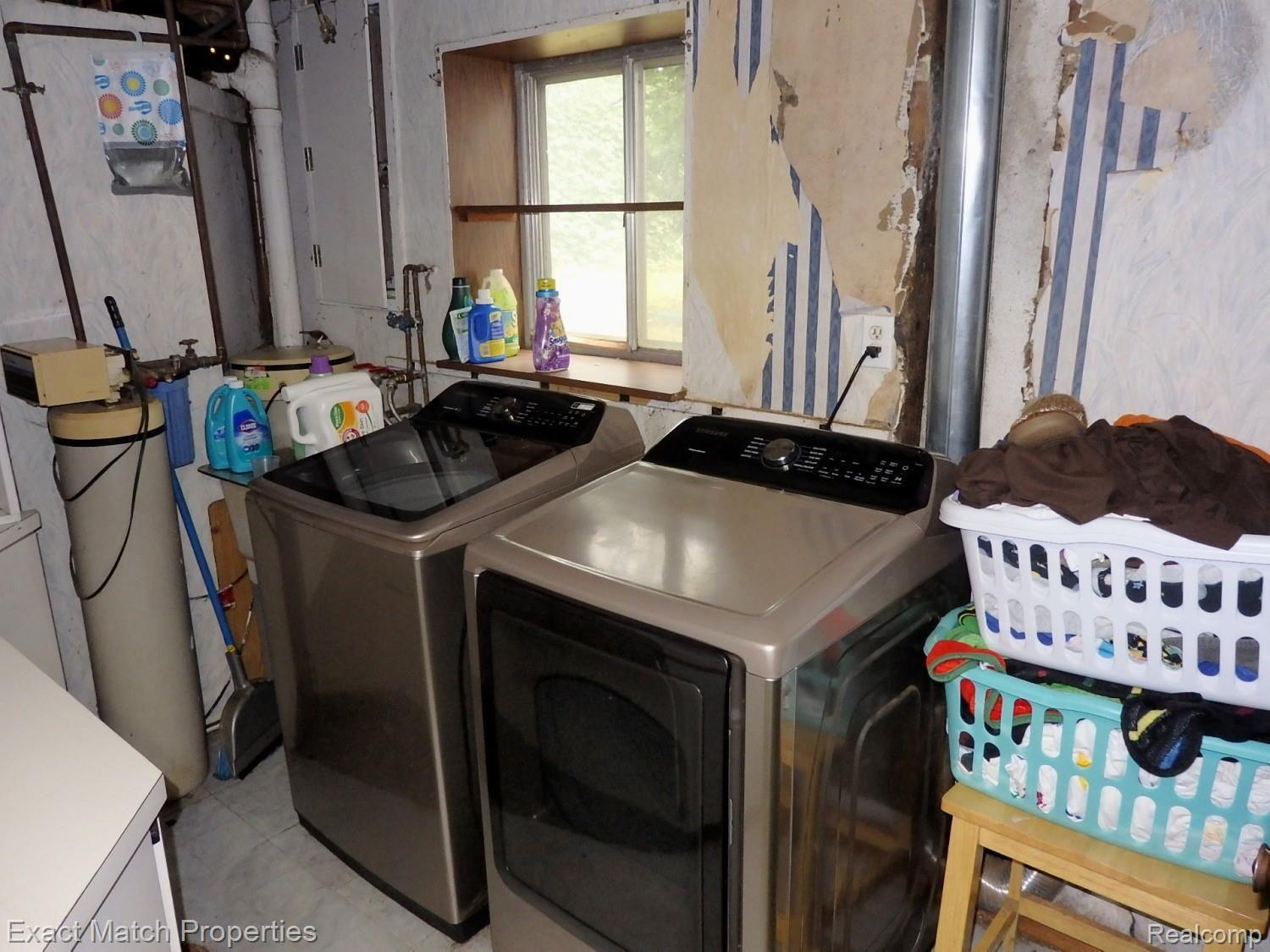1392 Delta Road Walled Lake, MI 48390 - Photo 48 of 48 Laundry room in lower level with daylight window.