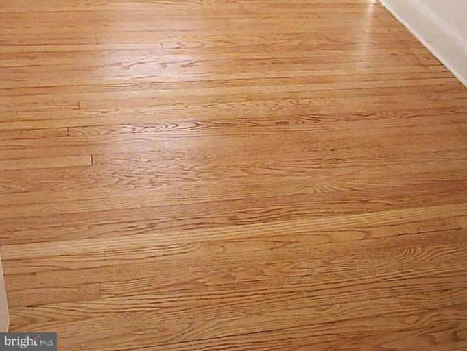 1541 Ralworth Road Baltimore, MD 21218 - Photo 13 of 24 Richly Restored Hardwood Floors