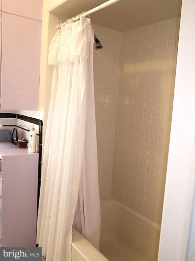 1541 Ralworth Road Baltimore, MD 21218 - Photo 9 of 24 Ceramic Tiled Shower/Tub Area