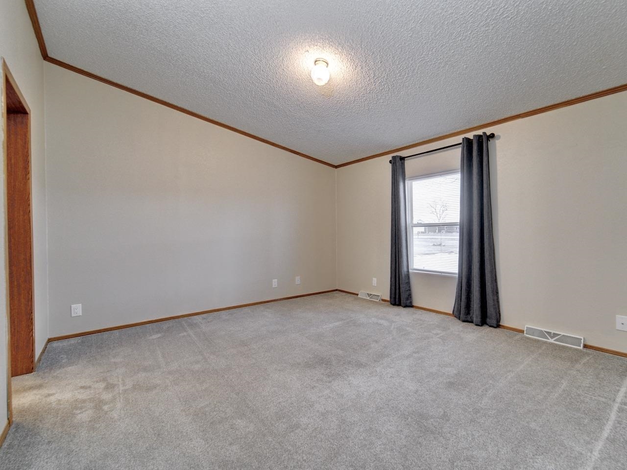 2206 I Road Grand Junction, CO 81505 - Photo 12 of 28 an empty room with windows