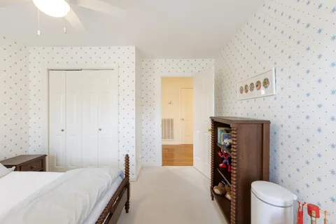 a en suite bathroom with a sink a toilet and a shower