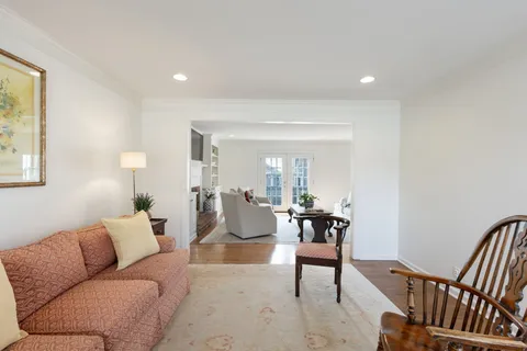 a living room with furniture and a table