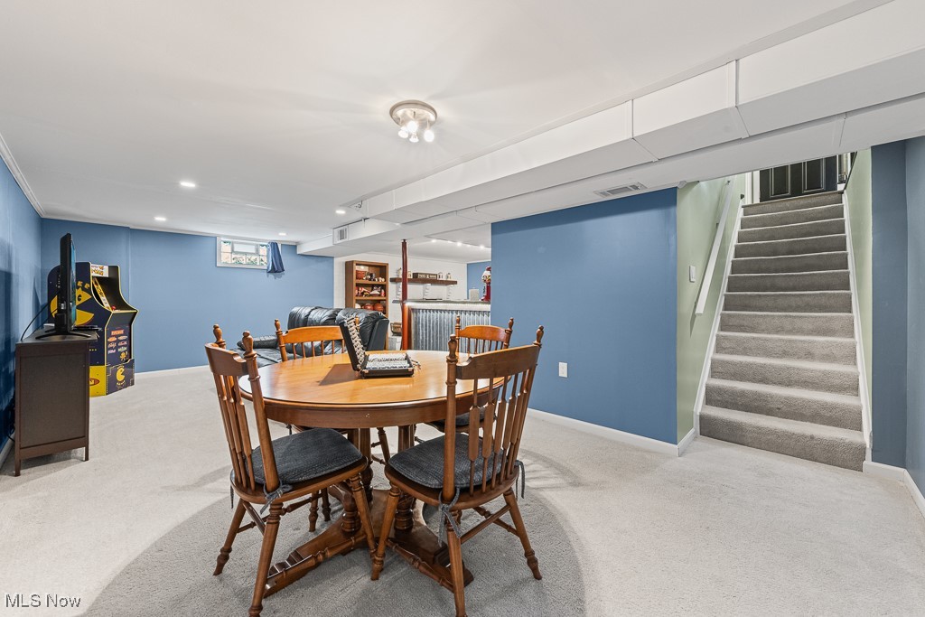 4000 Kenneth Road Stow, OH 44224 - Photo 31 of 50 Carpeted dining room with stairway and recessed lighting