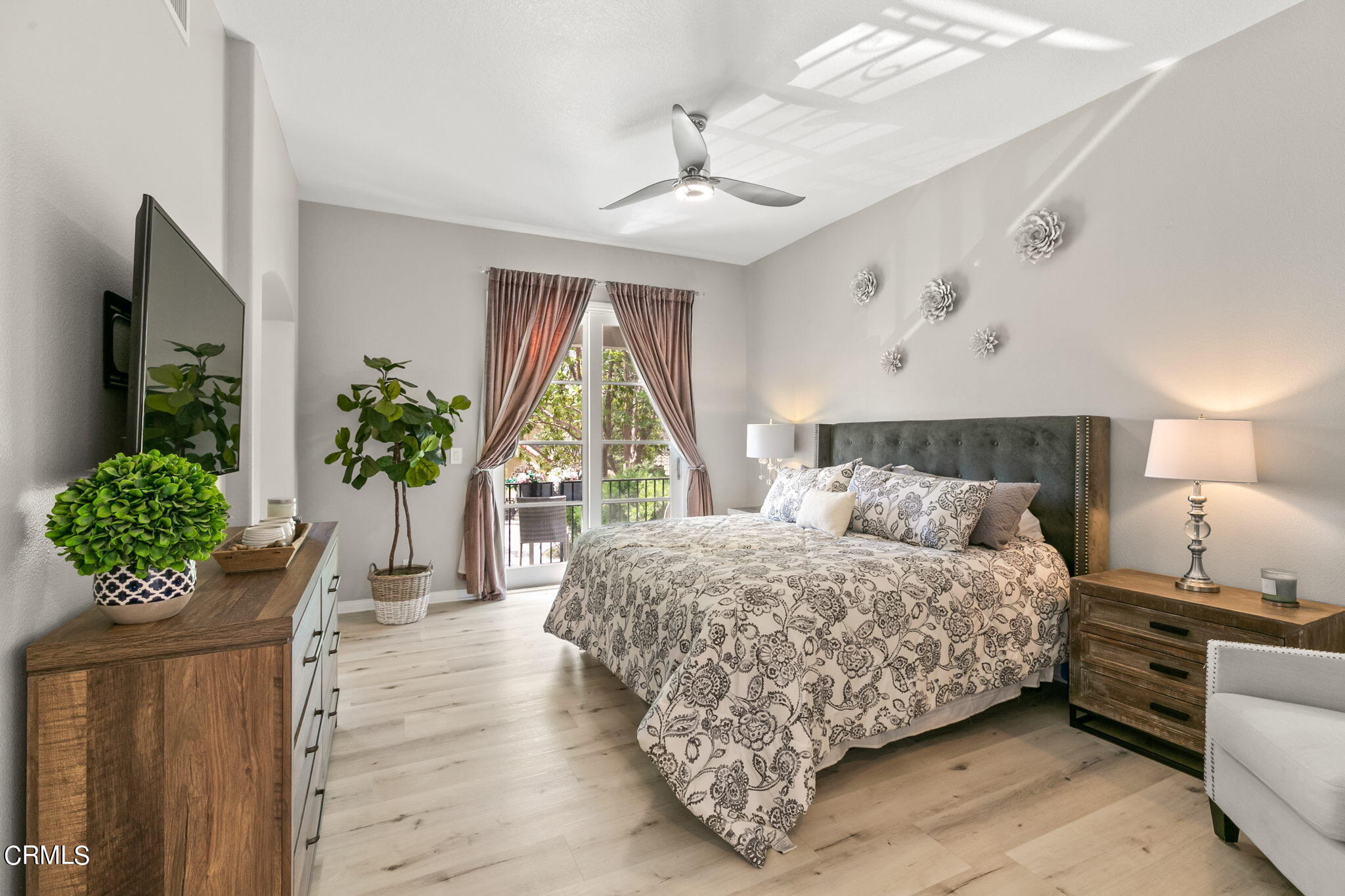1132 Corte Riviera Camarillo, CA 93010 - Photo 11 of 20 a bedroom with bed and a potted plant