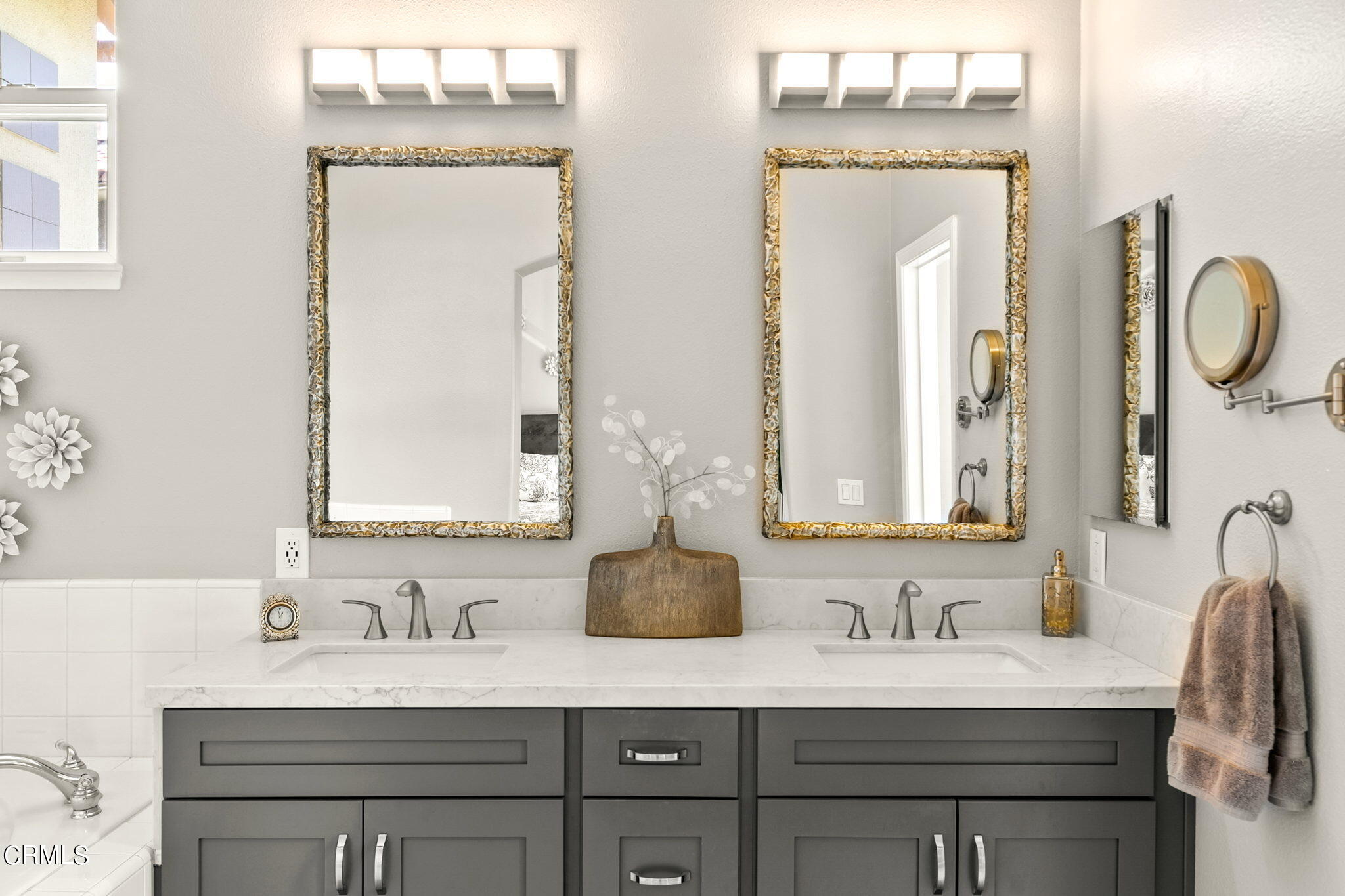 1132 Corte Riviera Camarillo, CA 93010 - Photo 14 of 20 a bathroom with a granite countertop sink vanity mirror and a