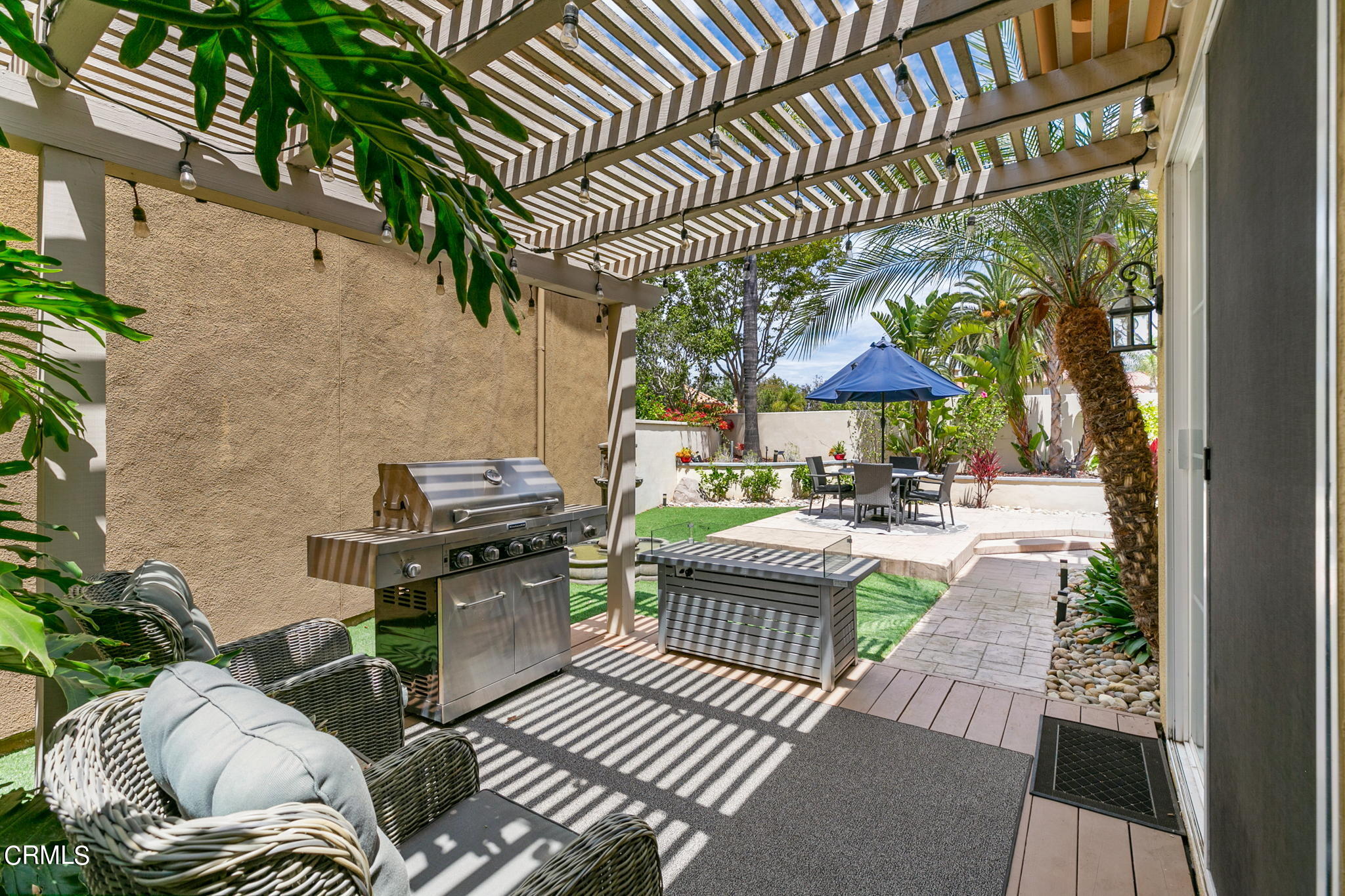 1132 Corte Riviera Camarillo, CA 93010 - Photo 15 of 20 a patio with glass top table and chairs