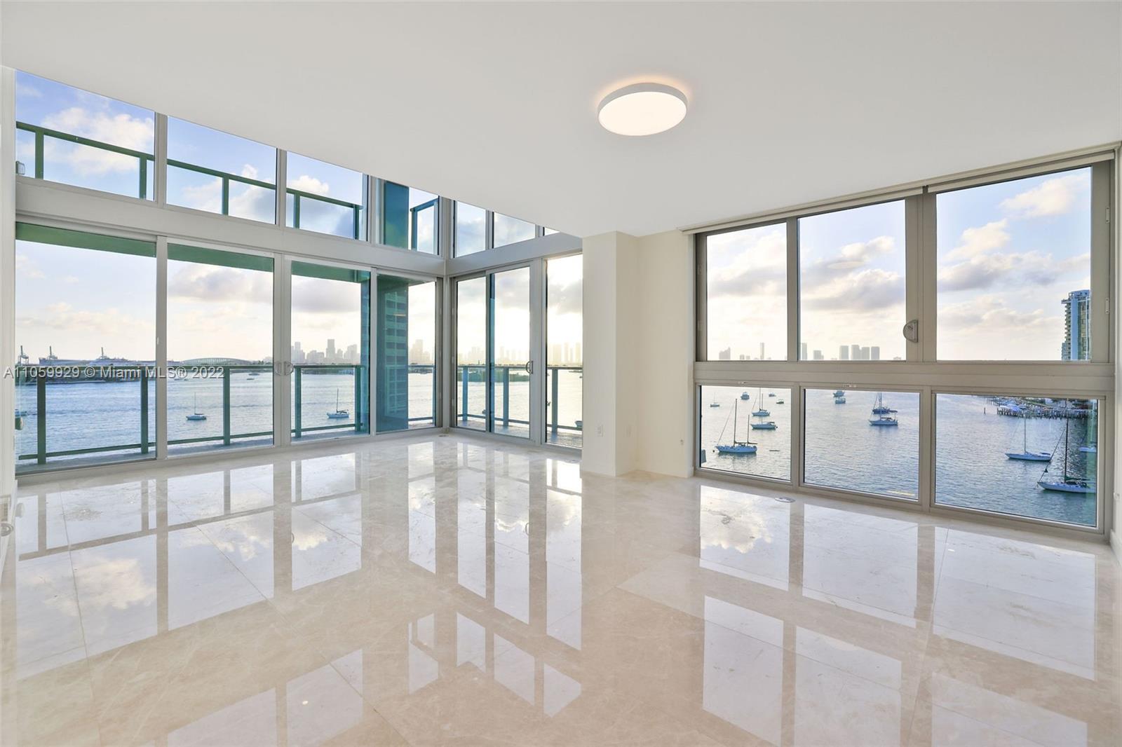 1504 Bay Road, Unit N0915 Miami Beach, FL 33139 - Photo 19 of 94 a view of an empty room with a large window
