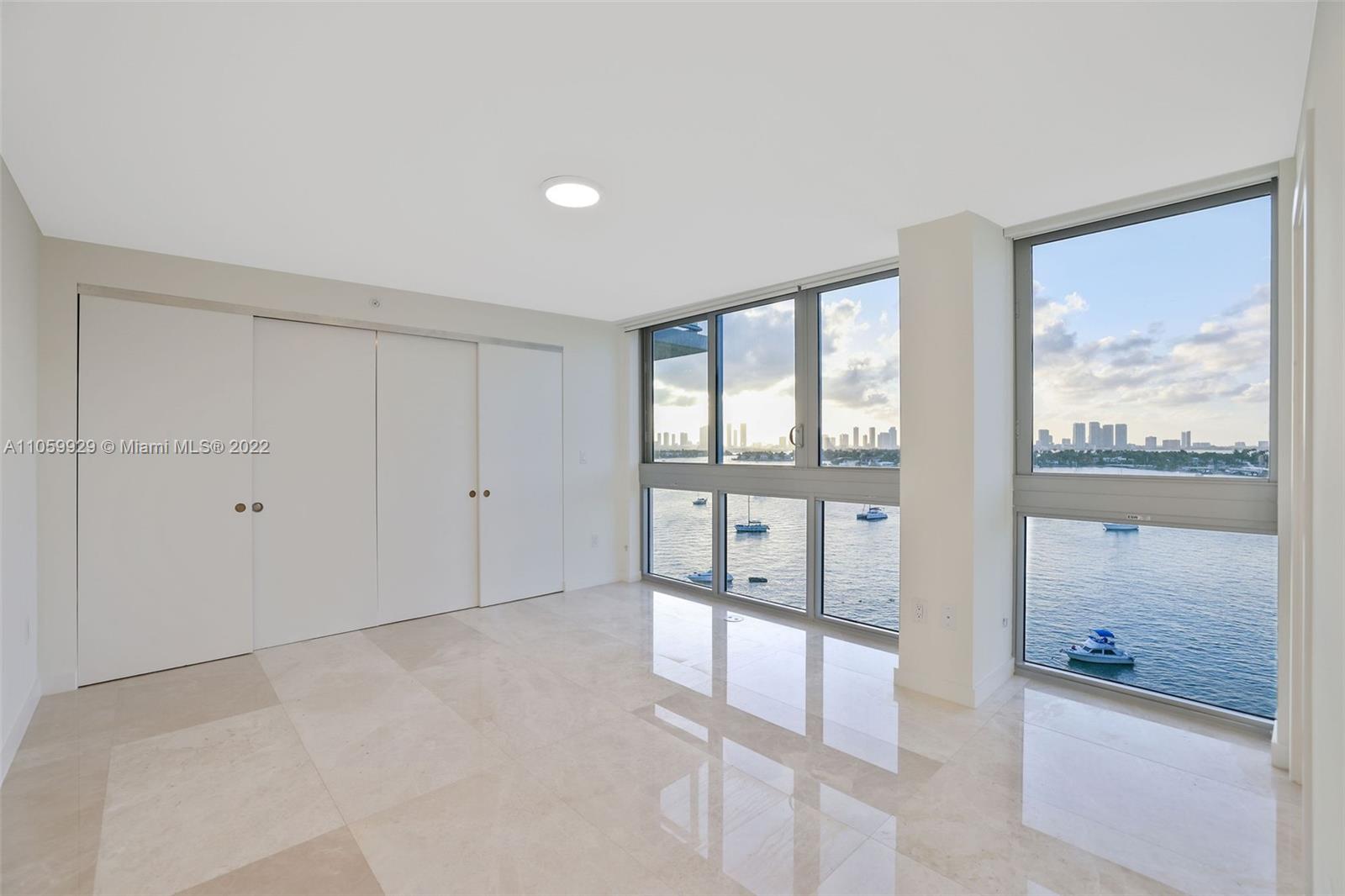 1504 Bay Road, Unit N0915 Miami Beach, FL 33139 - Photo 21 of 94 a view of an empty room and window