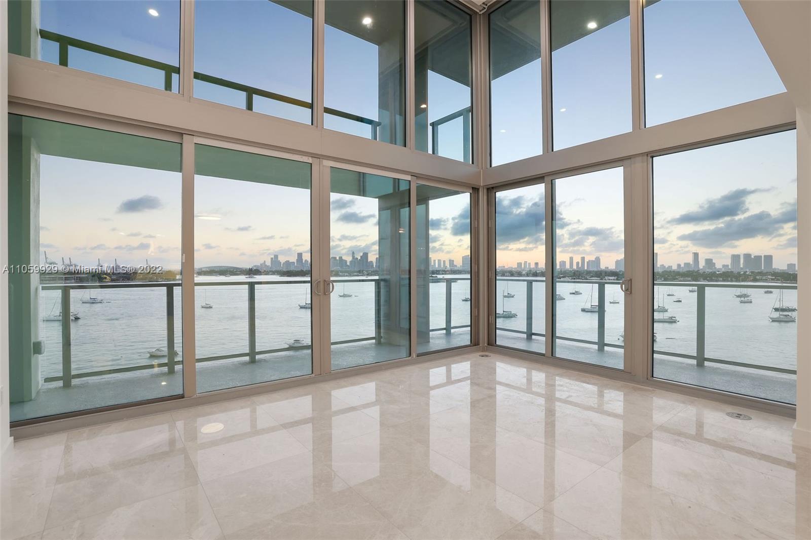 1504 Bay Road, Unit N0915 Miami Beach, FL 33139 - Photo 23 of 94 a view of an empty room with a large window
