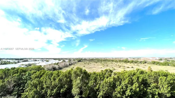a view of a balcony with an outdoor space