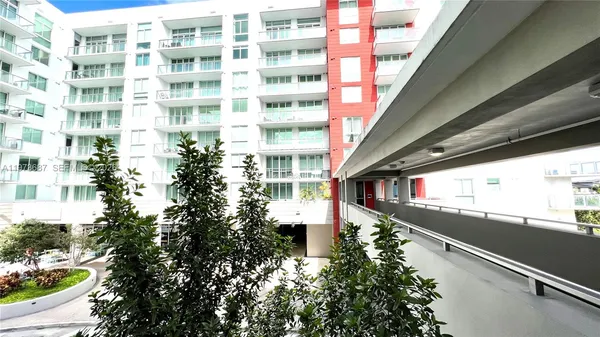 a living room with furniture and flat screen tv